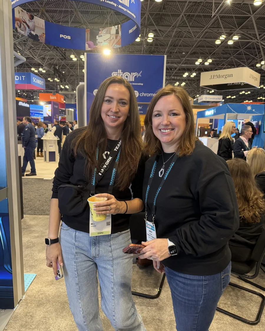 Teamwork Commerce team members on a retail trade show floor