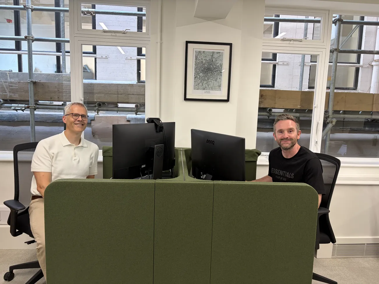 Two team members in the office